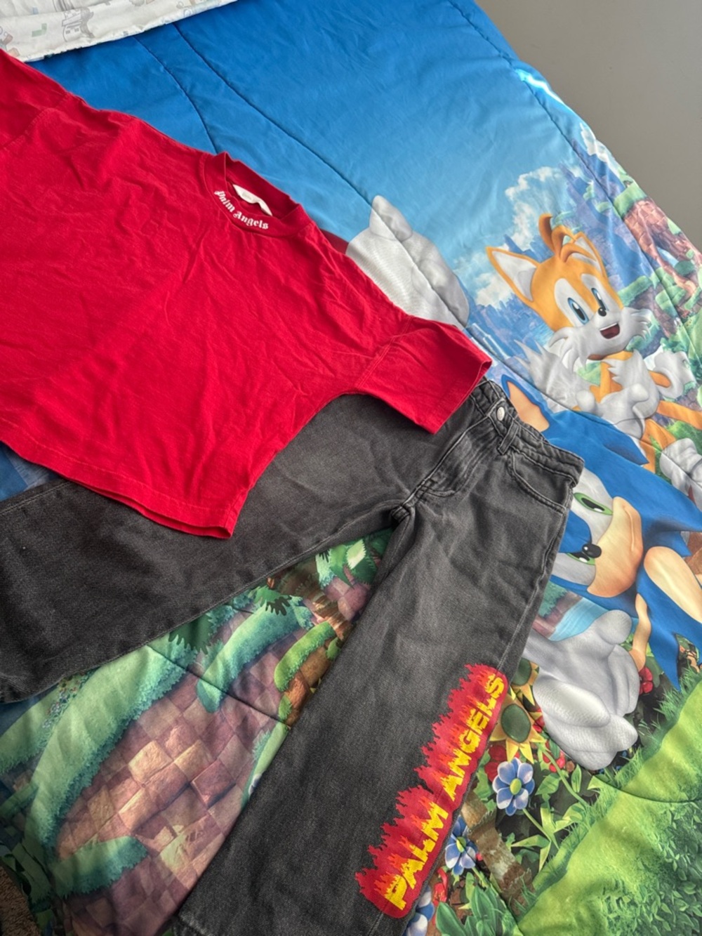 Palm Angels Red Tee with Black Jeans and Flame Logo